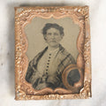 Lot 023 - Antique 1/9th Plate Tintype Of Middle Aged Woman In Mat Behind Glass With Lock Of Hair Memento, Shirt With Black Buttons