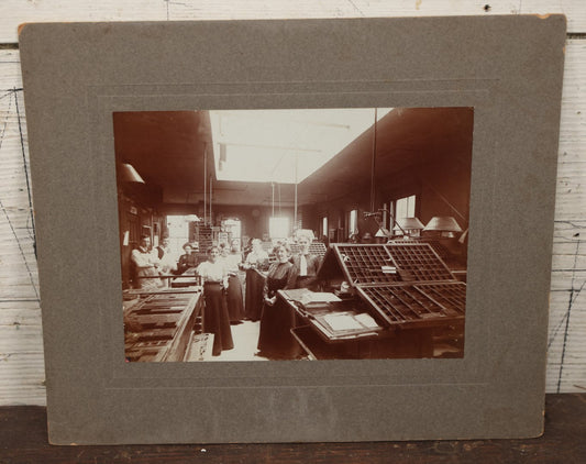Lot 066 - Antique Boarded Occupational Photograph Of A Print Shop Office, With Women And Men At Work, Type Trays