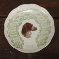 Lot 063 - Antique Porcelain Transferware 1909 Calendar Plate, With Dog, Compliments Of Grange Store, Amherst, Massachusetts, M.C. Co., E.L.O. Markings On Back