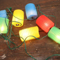 Lot 083 - Vintage Blow Mold Colorful Patio Christmas Tree String Lights, With Seven Lanterns, Paper Label From Xmas Tree Lighting Outfits, Catalogue No. 915-0, Working