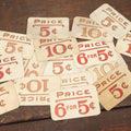 Lot 103 - Grouping Of 15 Medium Vintage Five And Dime Store Pricing Labels, 5C, 10C, And More, Embossed, Red Text, Approximately 3-1/2" x 5-1/2"