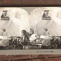 Lot 127 - Antique Spirit Photograph Stereo Card, "Her Guardian Angel" Featuring Ghostly Angel Over Sleeping Child, By Keystone View Company, Copyright 1898