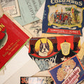 Lot 089 - Grouping Of 20+ Pieces Of Miscellaneous Antique And Vintage Advertising Including Can Labels For Victory Dog Food, Pink Salmon, Advertisement For Nell Brinley Curler, 1830s Bull Book, And More