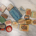 Lot 136 - Junk Drawer Grouping, 15+ Vintage And Antique Medicine Tins Including Aspirin, Chocolax, Ex-Lax, Caffeine, Edgeworth Tobacco, And More