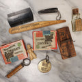 Lot 137 - Junk Drawer Grouping, 10 Vintage And Antique Advertising Pieces And More, Including Egyptienne Straights Cigarette Boxes, Sure Catch Mouse Trap, Dutchy Boy Figure, And More