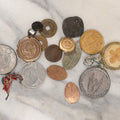 Lot 140 - Junk Drawer Grouping, 10+ Vintage And Antique Coins, Medallions, Buttons, And More, Including Four Leaf Clover Good Luck Keychain, Key Tag, Etc.