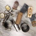 Lot 141 - Junk Drawer Grouping, 10+ Pieces Of Miscellaneous Metal And More Objects, Including Two Zippo Lighters, Cub Scout Neckerchief Tie, Napkin Rings, Keys, Watches, And More