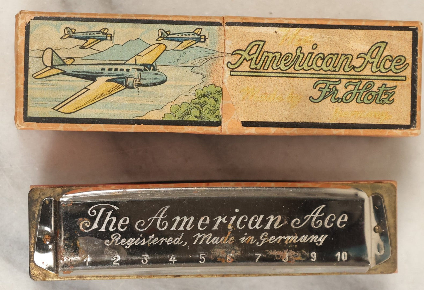 Lot 189 - American Ace Fr. Hotz Harmonica In Original Box With Aeroplanes, Circa 1920