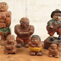 Lot 206 - Grouping Of Six Hand Carved Folk Art Painted Wooden Men, Including Little Man Singing And Playing Guitar, Wrestlers, And More