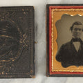 Lot 105 - Antique 1/6th Plate Ambrotype Of An Older Man With Odd Looking Eyes, Likely Blue Eyes, In Split Complete Patriotic Letherette Union Case, With Eagle Holding Shield, Flags