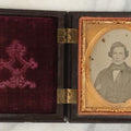 Lot 108 - Antique 1/9th Plate Ambrotype Of A Handsome Young Man, Note Compass And Square Brooch On Bowtie, Likely A Mason, In Thermoplastic Case