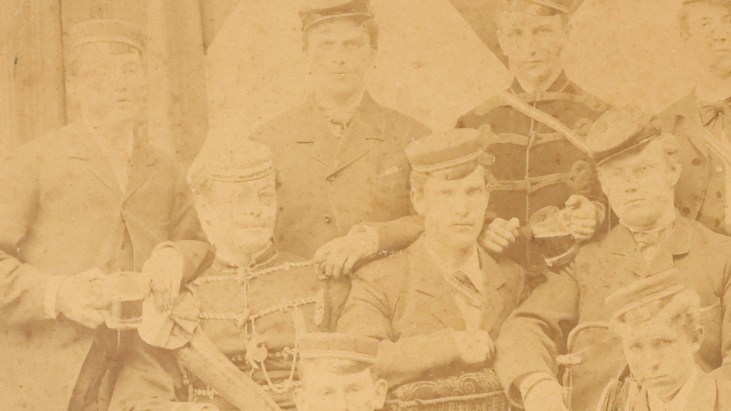 Lot 126 - Antique Boarded Group Photo, Very Poor Condition, Many Losses And Breaks, Of A German Fraternal Or Military Organization, With Many Flags And Regalia, Men Holding Mugs Of Beer (Note Man From Lot 123, Left Side Middle Row)