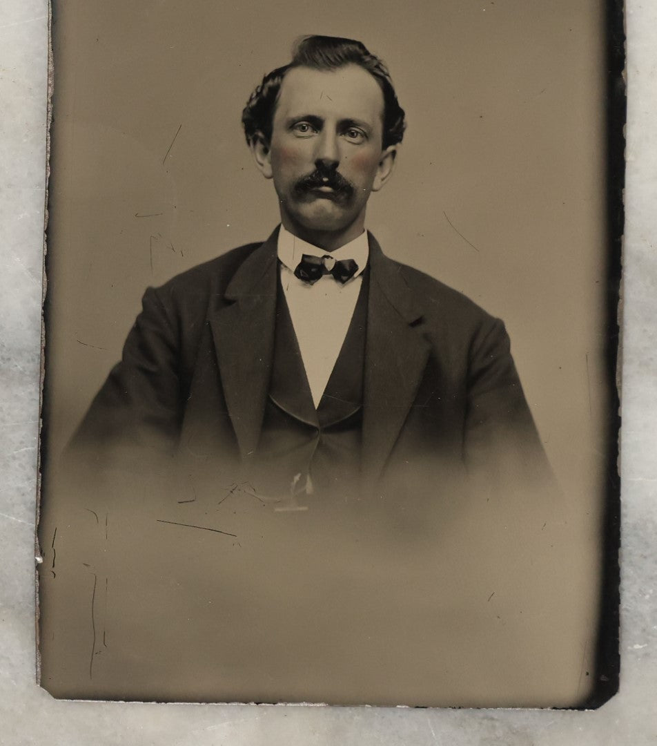 Lot 132 - Grouping Of Fifteen Antique Tintype Photographs Of Men, Including Old Man With White Hair And Grin, Bearded Man In Hat, Man With Large Mustache, Man With Nautical Backdrop, And Others