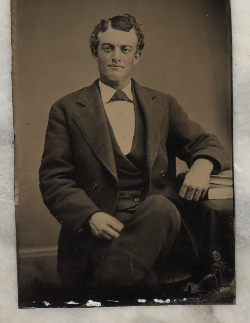Lot 132 - Grouping Of Fifteen Antique Tintype Photographs Of Men, Including Old Man With White Hair And Grin, Bearded Man In Hat, Man With Large Mustache, Man With Nautical Backdrop, And Others