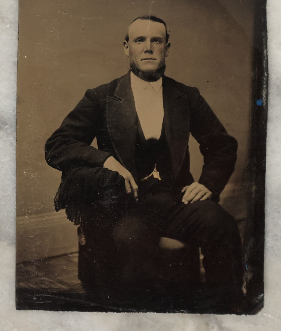 Lot 132 - Grouping Of Fifteen Antique Tintype Photographs Of Men, Including Old Man With White Hair And Grin, Bearded Man In Hat, Man With Large Mustache, Man With Nautical Backdrop, And Others