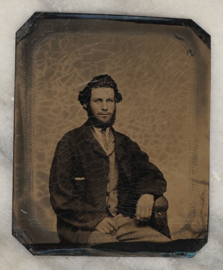 Lot 132 - Grouping Of Fifteen Antique Tintype Photographs Of Men, Including Old Man With White Hair And Grin, Bearded Man In Hat, Man With Large Mustache, Man With Nautical Backdrop, And Others