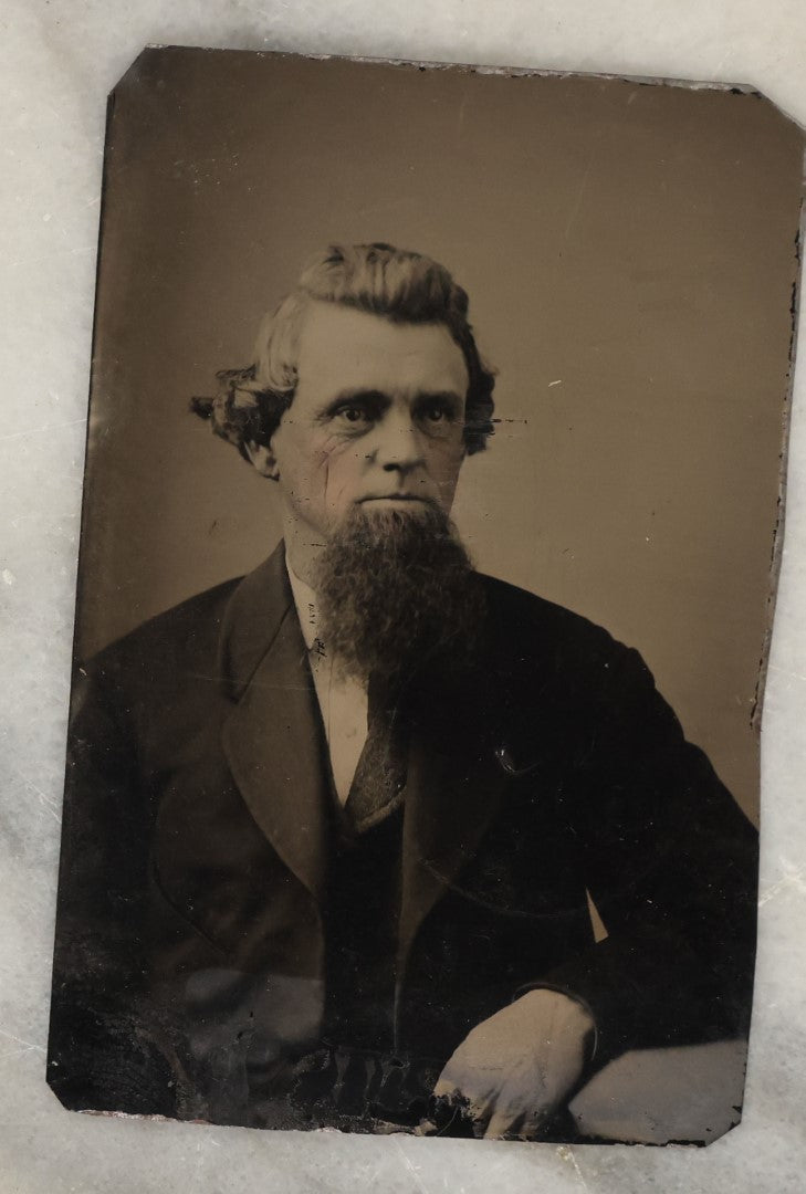 Lot 132 - Grouping Of Fifteen Antique Tintype Photographs Of Men, Including Old Man With White Hair And Grin, Bearded Man In Hat, Man With Large Mustache, Man With Nautical Backdrop, And Others