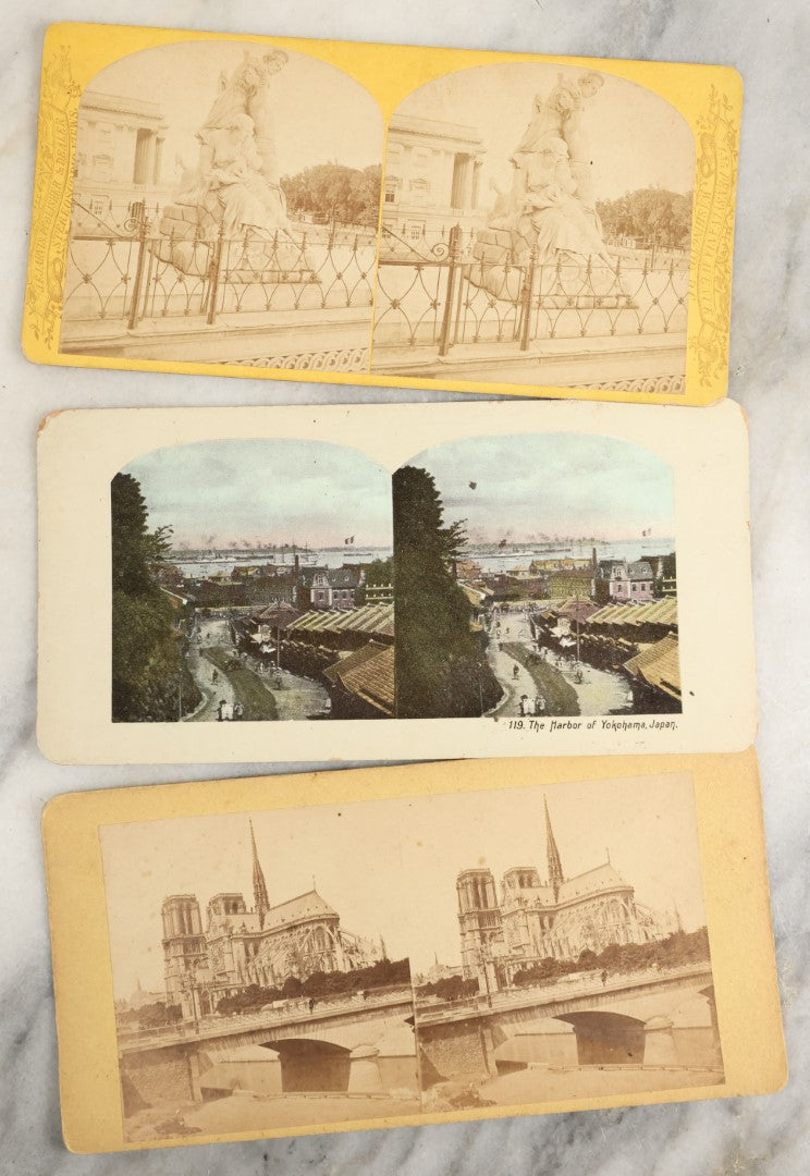 Lot 142 - Grouping Of Nine Antique Stereo Optic Stereo View Cards Depicting Landmarks Including Notre Dame, The Harbor Of Yokohama, Japan, Lone Star Geyser, Yellowstone National Park, And Others