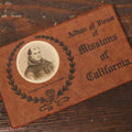 Lot 085 - Album Views Of Missions In California, Vintage Postcard Folio, With Junipero Serra On Cover, Engraved, Printed, And Published By Van Ornum Colorprint Co., Los Angeles, California