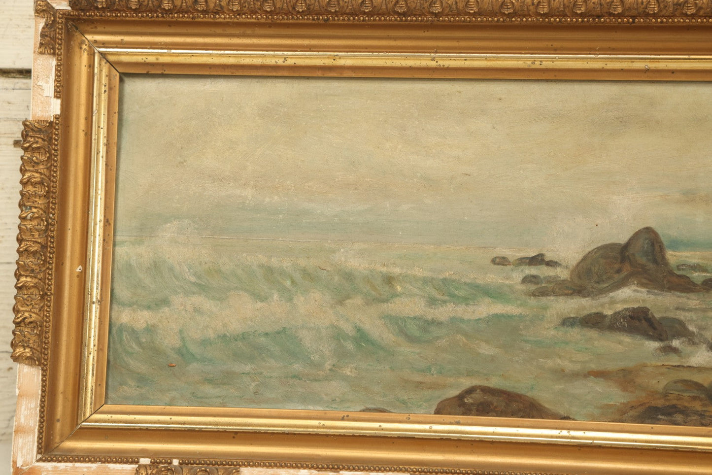 Lot 003 - Antique Seascape Nautical Painting On Board In Gilded Gesso Frame, Waves Crashing On Rocks, Shore, Note Significant Gesso Loss, 10-5/8" x 23-1/2"