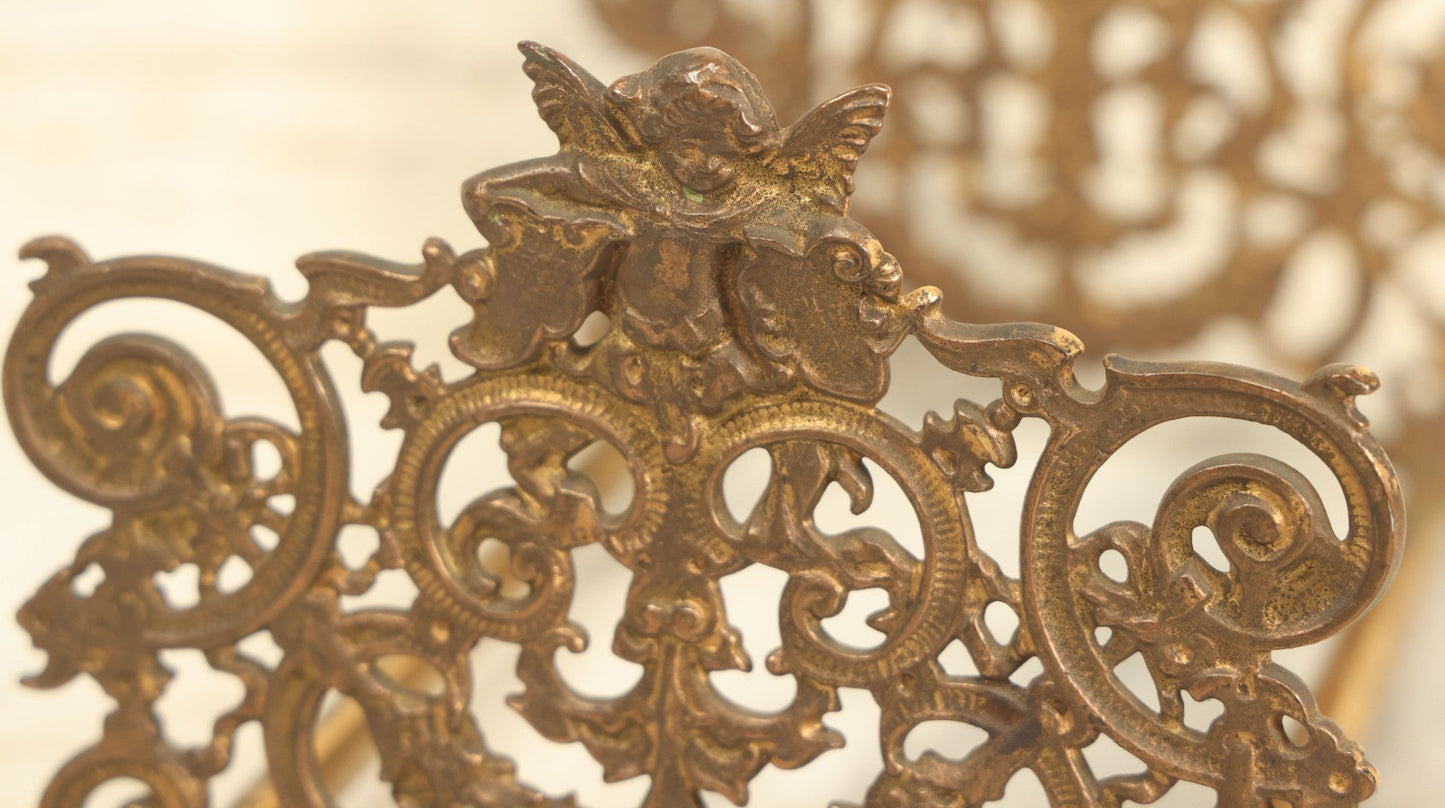 Lot 004 - Antique Brass Ormolu Extendable Book Stand With Cherub Motif