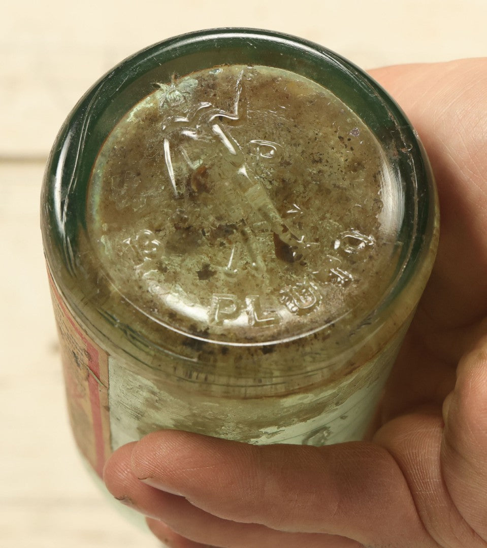 Lot 005 - Antique Pluto Water Glass Bottle With Original Paper Label, Devil Graphics, French Lick Springs Hotel Co., French Lick, Indiana, With Embossed Devil On Bottom, Drilled Cap
