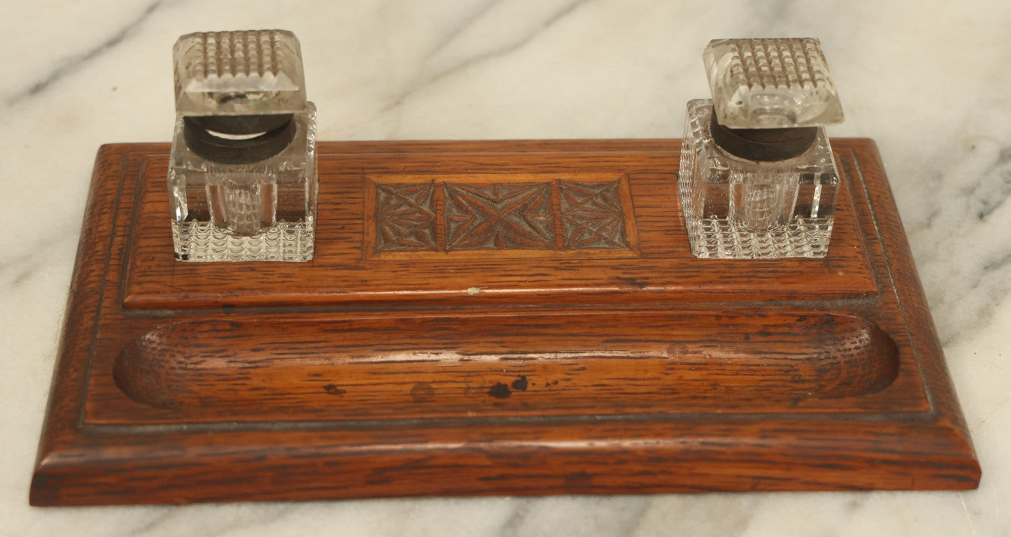 Lot 036 - Antique Hand Carved Folk Art Pen And Ink Stand With Geometric Carving, Two Glass Inkwells, Note Various Wear To Inkwells