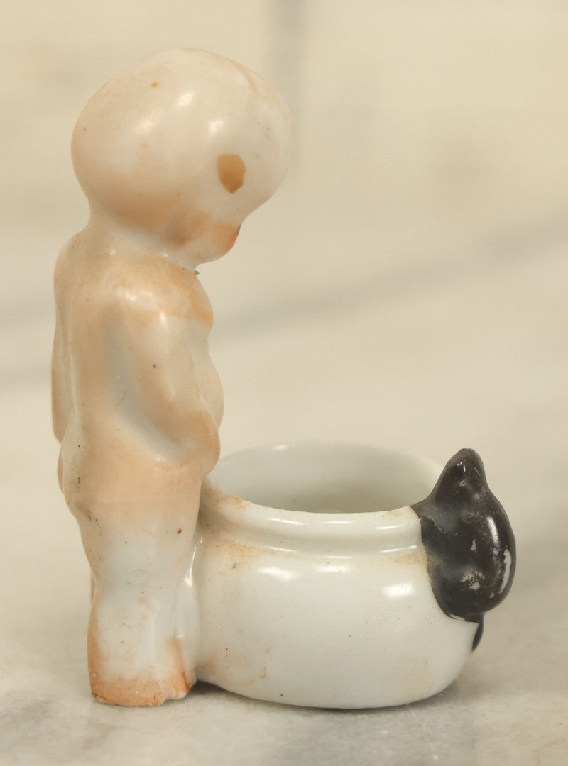 Lot 039 - Vintage Porcelain Baby Chamber Pot Figurine, Baby Looking Down At Potty With Mouse Crawling Out Of It, Made In Japan
