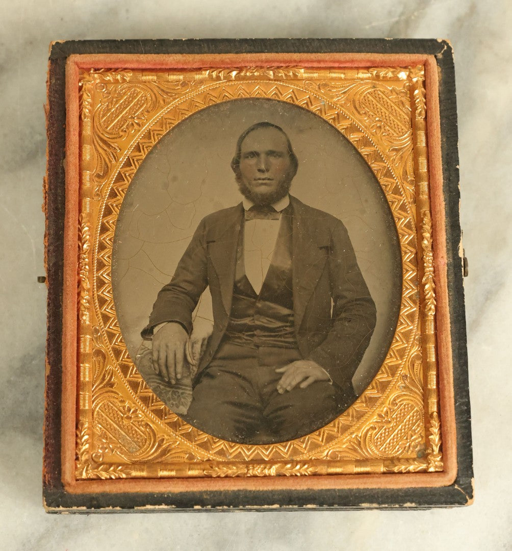 Lot 073 - Antique 1/6th Plate Ambrotype Photograph Of A Middle Aged Man With A Bearded Chin, Tinted Red Cheeks, Seated