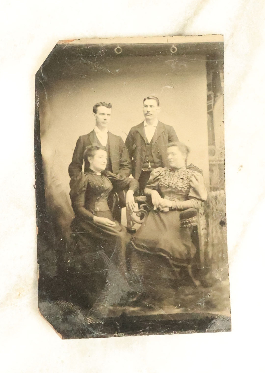 Lot 100 - Grouping Of Nine Antique Tintype Photographs, Mostly Of Groups Of Three Women, With Extravagant Dress