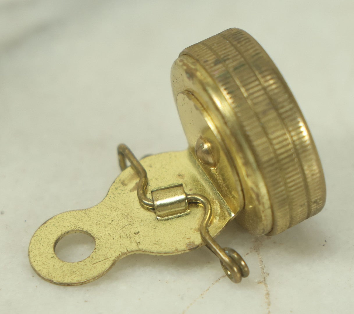 Lot 140 - Vintage Pin On Brass Miniature Compass With Black Light Sensitive Glow In The Dark Letters