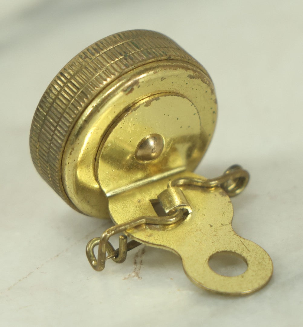 Lot 140 - Vintage Pin On Brass Miniature Compass With Black Light Sensitive Glow In The Dark Letters