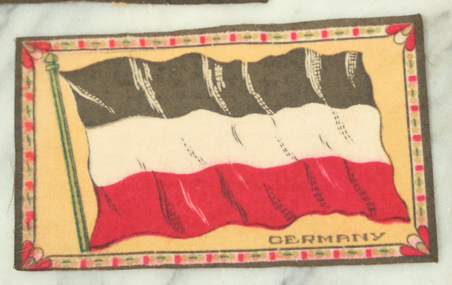 Lot 141 - Grouping Of Seven Antique Tobacco Felt Country Flags Including The United States Jack, France, Austria Hungary, Zion, Belgium, Germany, And France