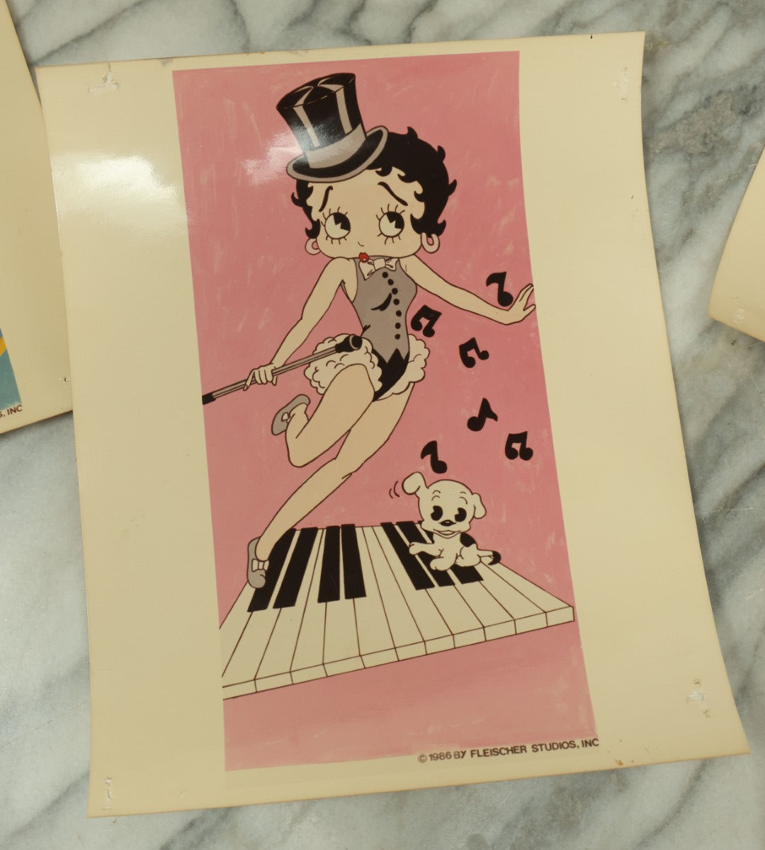 Lot 090 - Grouping Of Six Vintage Glossy Photos Of Cartoon Artwork Including Betty Boop, Pink Panther, Flintstones, And Gumby, 1980s, Hanna-Barbera, Fleischer Studios, Etc.