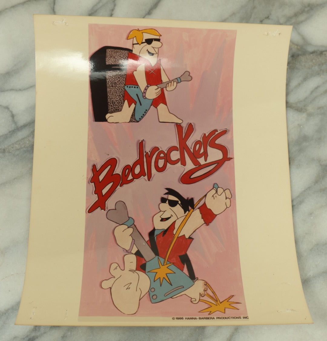 Lot 090 - Grouping Of Six Vintage Glossy Photos Of Cartoon Artwork Including Betty Boop, Pink Panther, Flintstones, And Gumby, 1980s, Hanna-Barbera, Fleischer Studios, Etc.