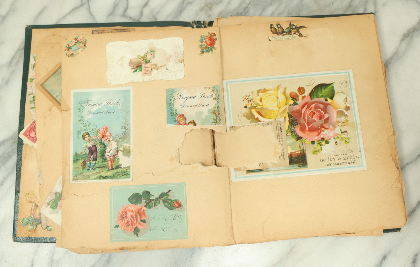 Lot 091 - Antique Victorian Scrapbook Album Featuring Many Lithographed Trade Cards, With Green Cover With Chinese Motif, As Found, Note Wear And Tear