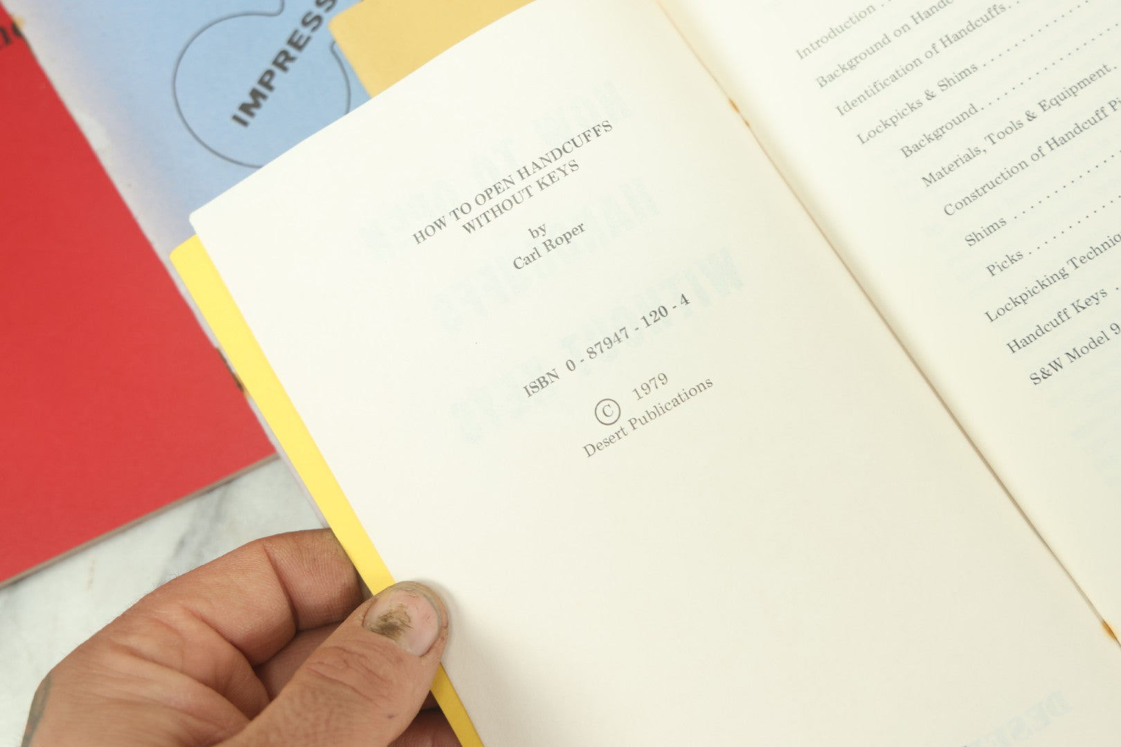 Lot 094 - Grouping Of Seven Booklets On Handcuffs And Locksmithing, Including How To Open Handcuffs Without Keys, Lock Picking, Etc., By Desert Publications, Late 1970s