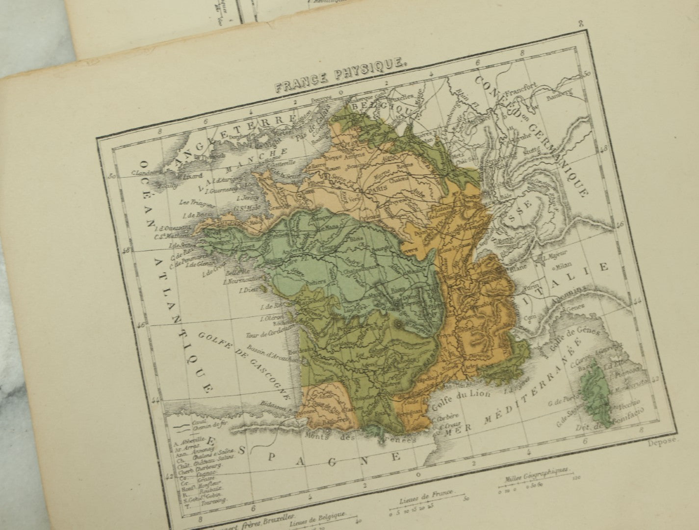 Lot 096 - Grouping Of 10+ Pages From An Antique French Atlas, Including A Diagram Of The Solar System, Maps Of Europe, The America's, Etc.