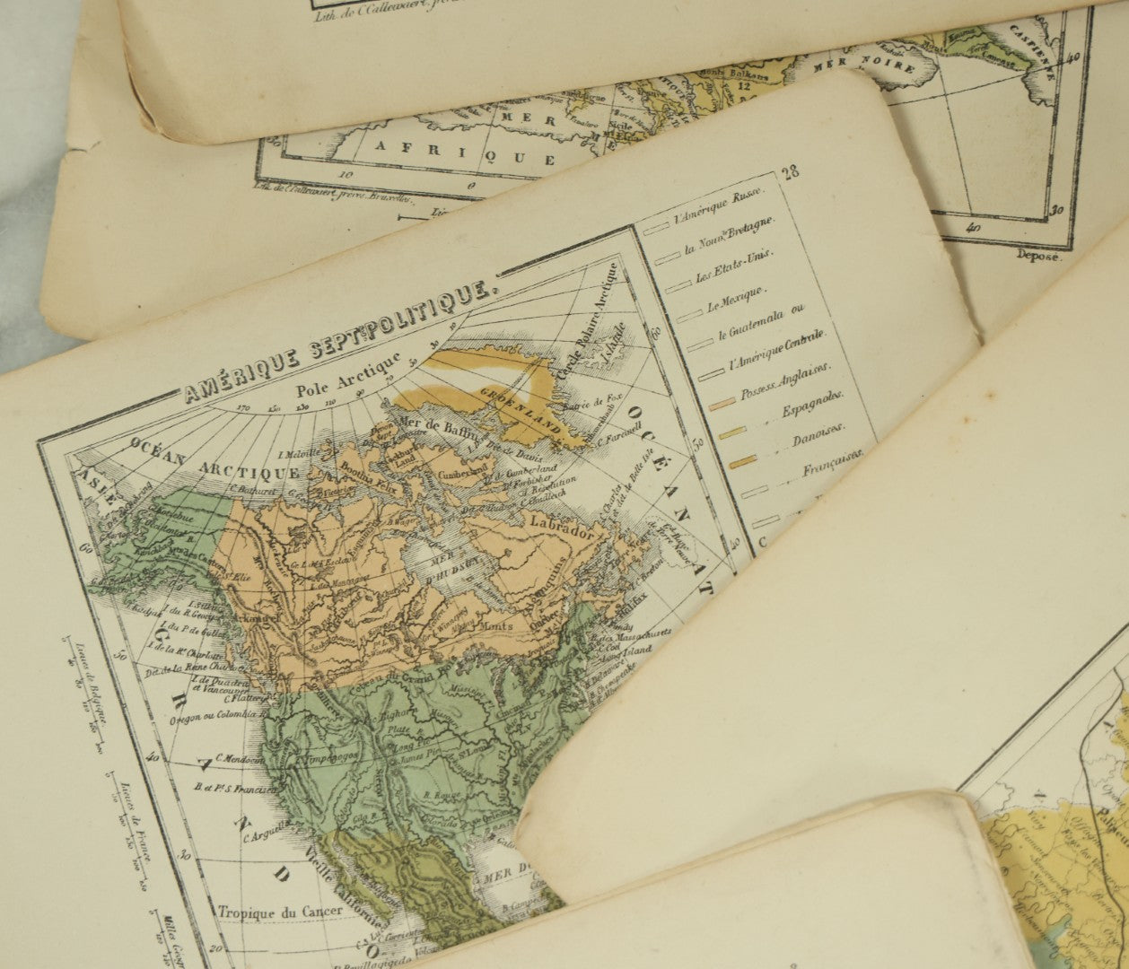 Lot 096 - Grouping Of 10+ Pages From An Antique French Atlas, Including A Diagram Of The Solar System, Maps Of Europe, The America's, Etc.