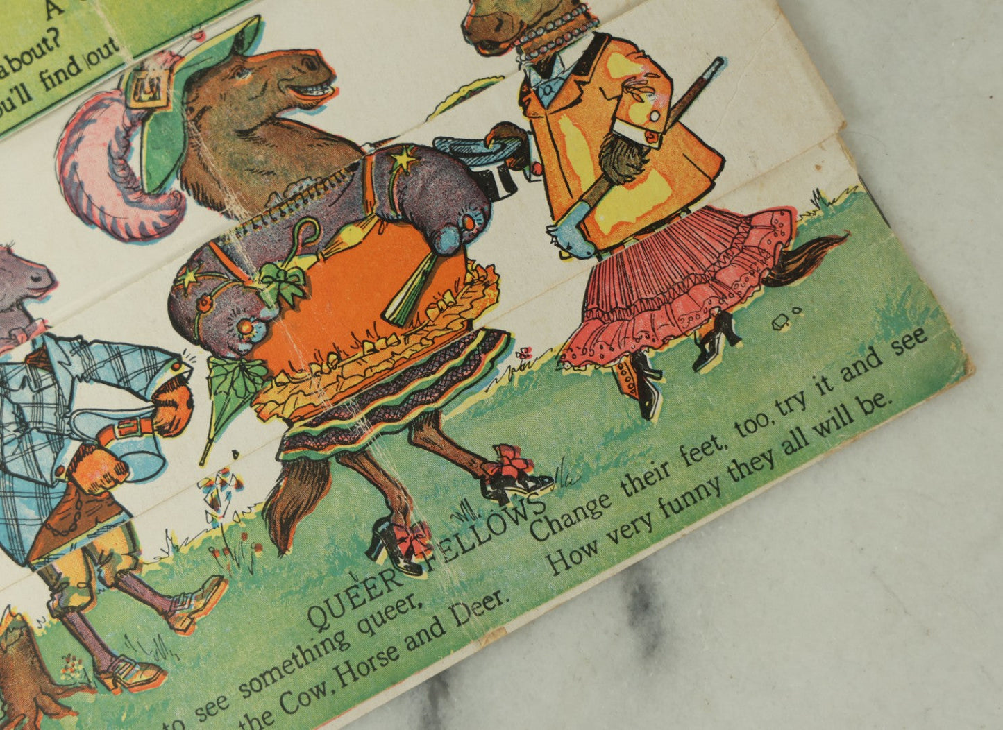 Lot 097 - Antique Kellogg's Cereal Advertising Book, "Funny Jungleland Moving Pictures" With Anthropomorphic Animals, Pages Flip To Mix And Match Heads, Outfits, Bodies, Copyright 1909 By W.K. Kellogg, Battle Creek, Michigan