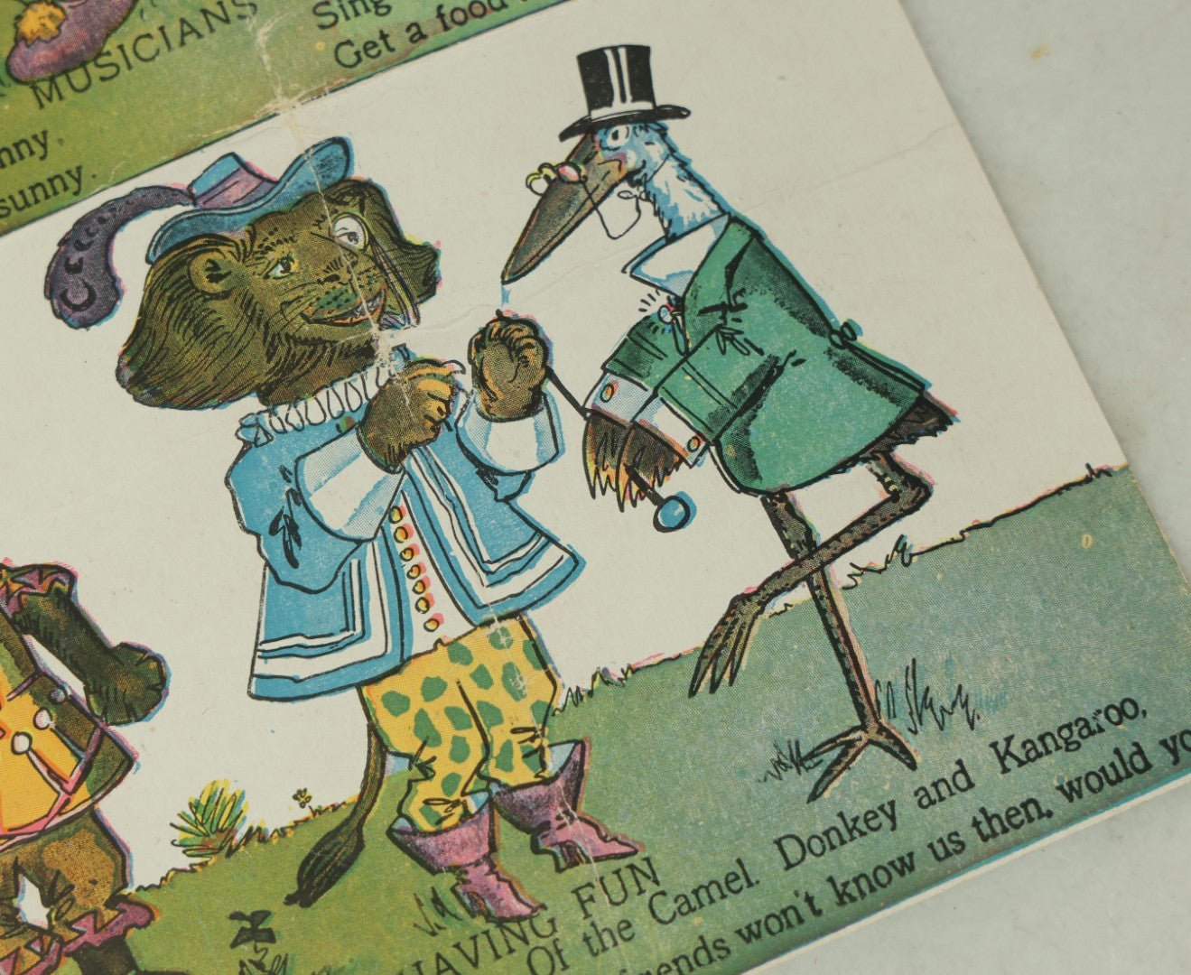 Lot 097 - Antique Kellogg's Cereal Advertising Book, "Funny Jungleland Moving Pictures" With Anthropomorphic Animals, Pages Flip To Mix And Match Heads, Outfits, Bodies, Copyright 1909 By W.K. Kellogg, Battle Creek, Michigan