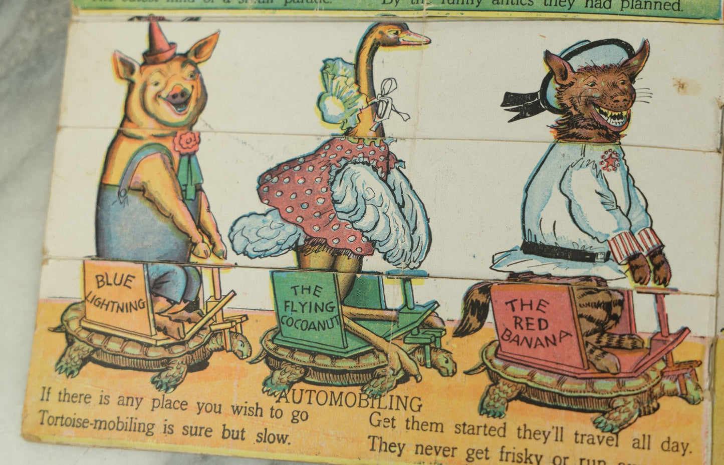 Lot 097 - Antique Kellogg's Cereal Advertising Book, "Funny Jungleland Moving Pictures" With Anthropomorphic Animals, Pages Flip To Mix And Match Heads, Outfits, Bodies, Copyright 1909 By W.K. Kellogg, Battle Creek, Michigan