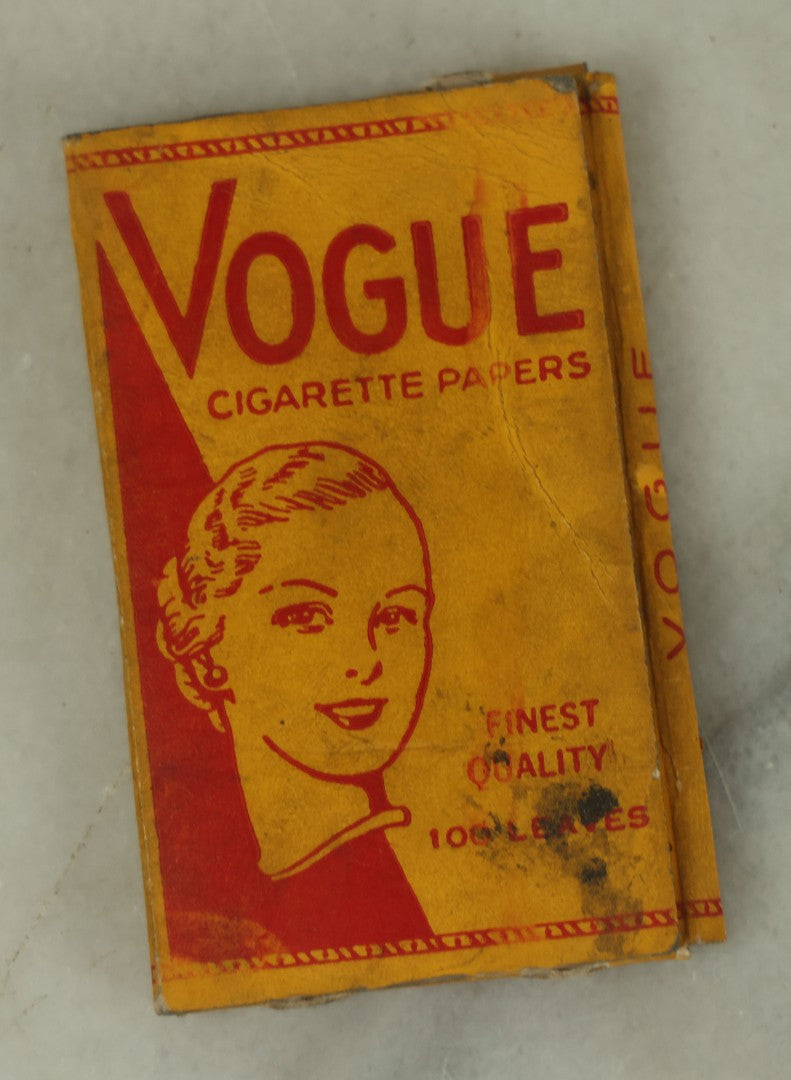 Lot 109 - Three Piece Ephemera Grouping Including Pinup Blotter For Herman Cohn, Inc Naval Uniforms, Vogue Cigarette Papers, And Joan Bennett Movie Star Card