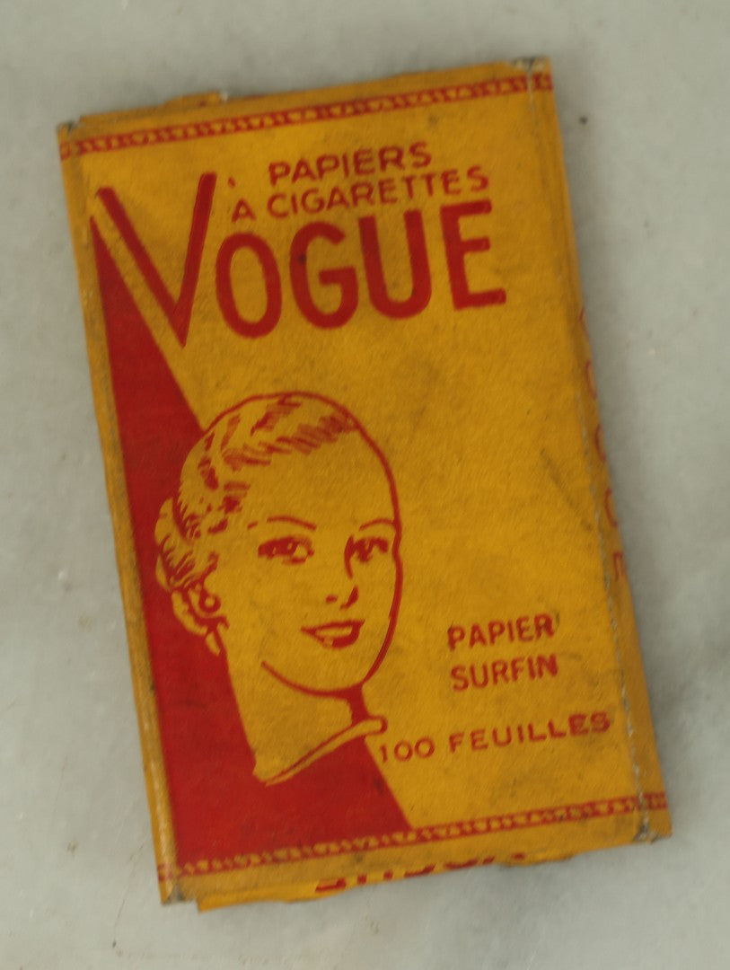 Lot 109 - Three Piece Ephemera Grouping Including Pinup Blotter For Herman Cohn, Inc Naval Uniforms, Vogue Cigarette Papers, And Joan Bennett Movie Star Card