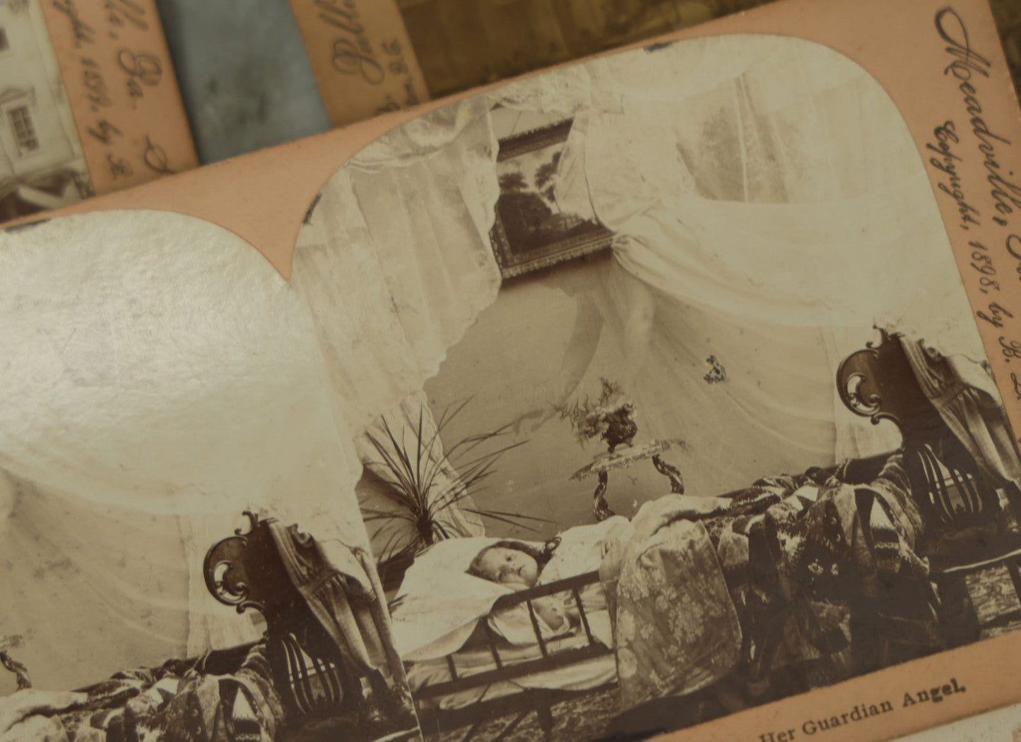 Lot 110 - Grouping Of Five Antique Stereo View Stereo Optic Photograph Cards Including "Her Guardian Angel" Trick Shot Spirit Ghost Photograph, Other Landmarks, Scenes