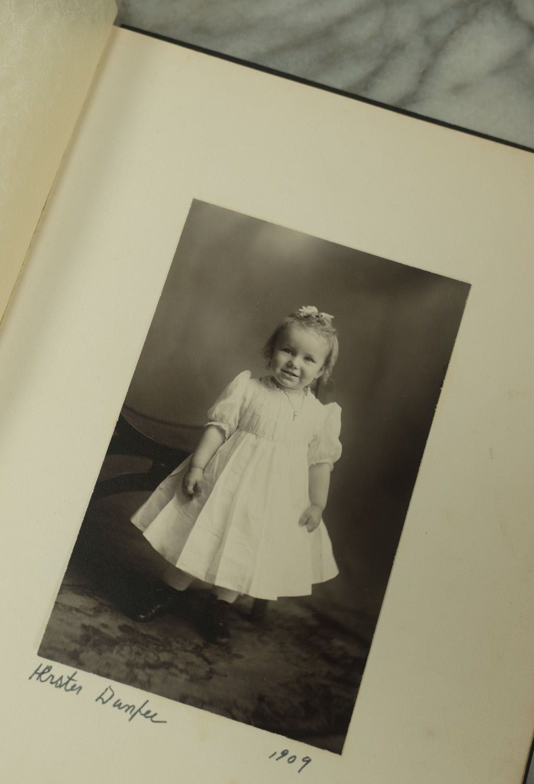 Lot 111 - Sparse Antique Family Portrait Photo Album By Merrill, Waltham, Massachusetts, With Four Photos, Children, Family, Etc.