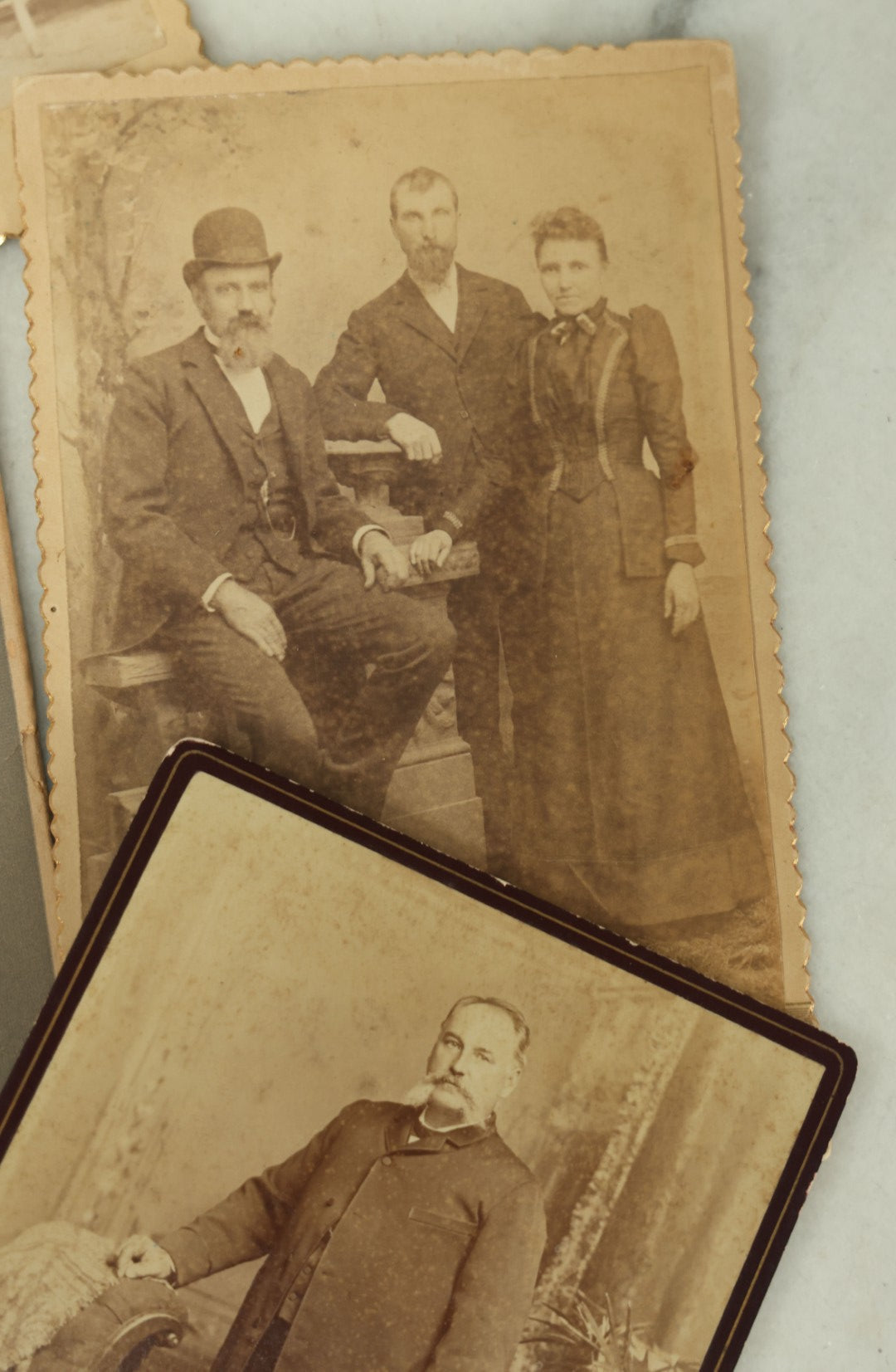 Lot 114 - Grouping Of Seven Assorted Cabinet Card Photographs Of Men, Children, And Families, Photographers From New York, New Jersey, Etc.