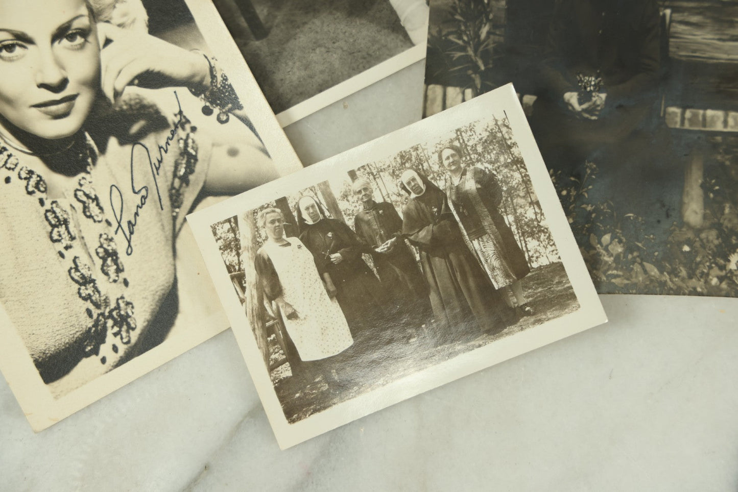 Lot 115 - Grouping Of Ten Vintage And Antique Snapshot And Real Photo Postcard Photos Of Women And Girls Including Nuns, Pin-Ups, Old Lady, Girls In Costumes, Etc.