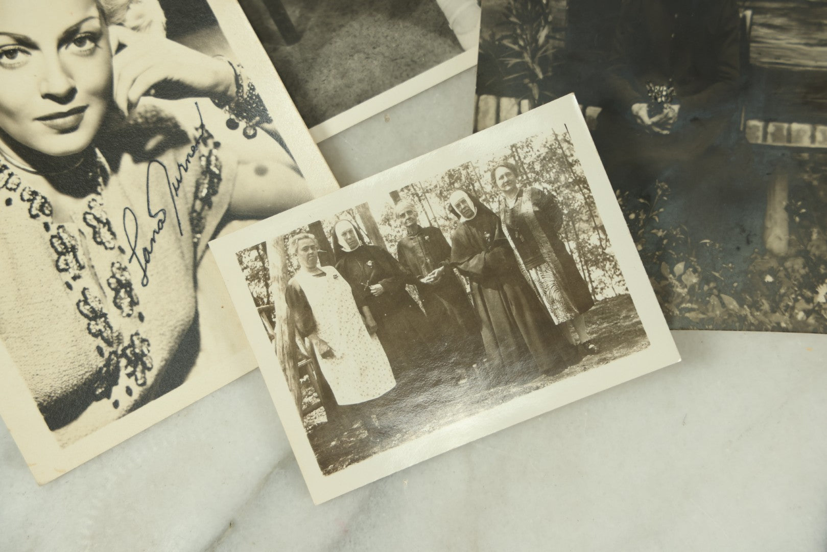 Lot 115 - Grouping Of Ten Vintage And Antique Snapshot And Real Photo Postcard Photos Of Women And Girls Including Nuns, Pin-Ups, Old Lady, Girls In Costumes, Etc.