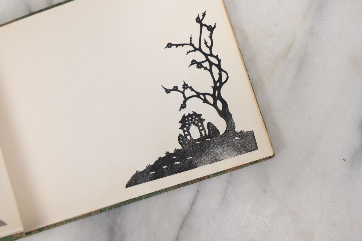 Lot 120 - Vintage East Asian Cloth Covered Art Book With Black Paper Cut Silhouettes